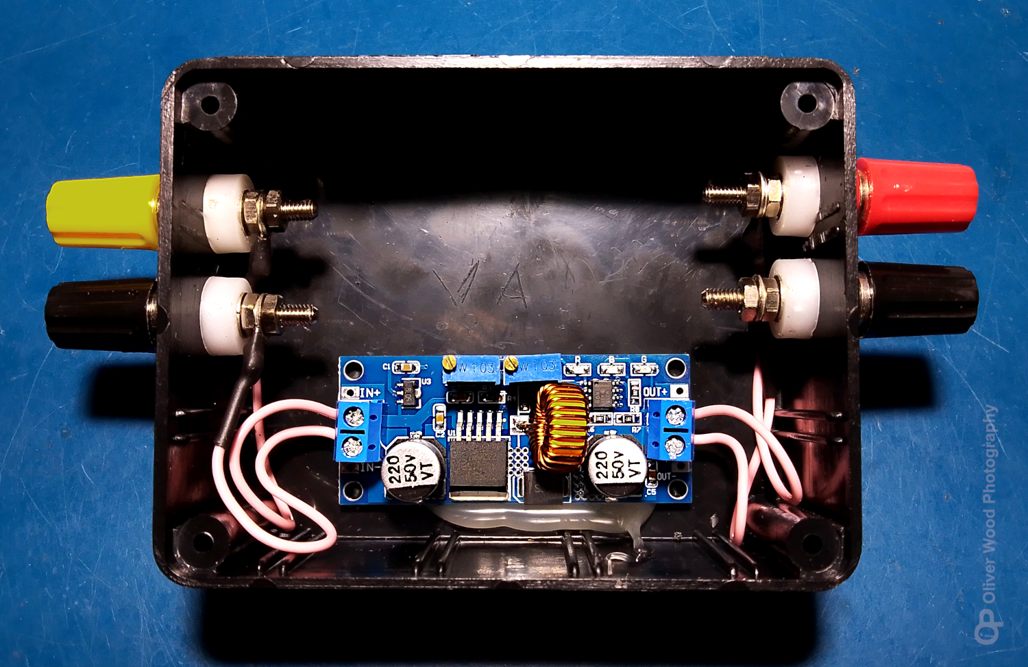 electronic device in a box with coloured connectors.